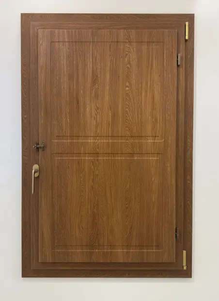 Pannello di porta in PVC honey oak supermatt con maniglia in acciaio